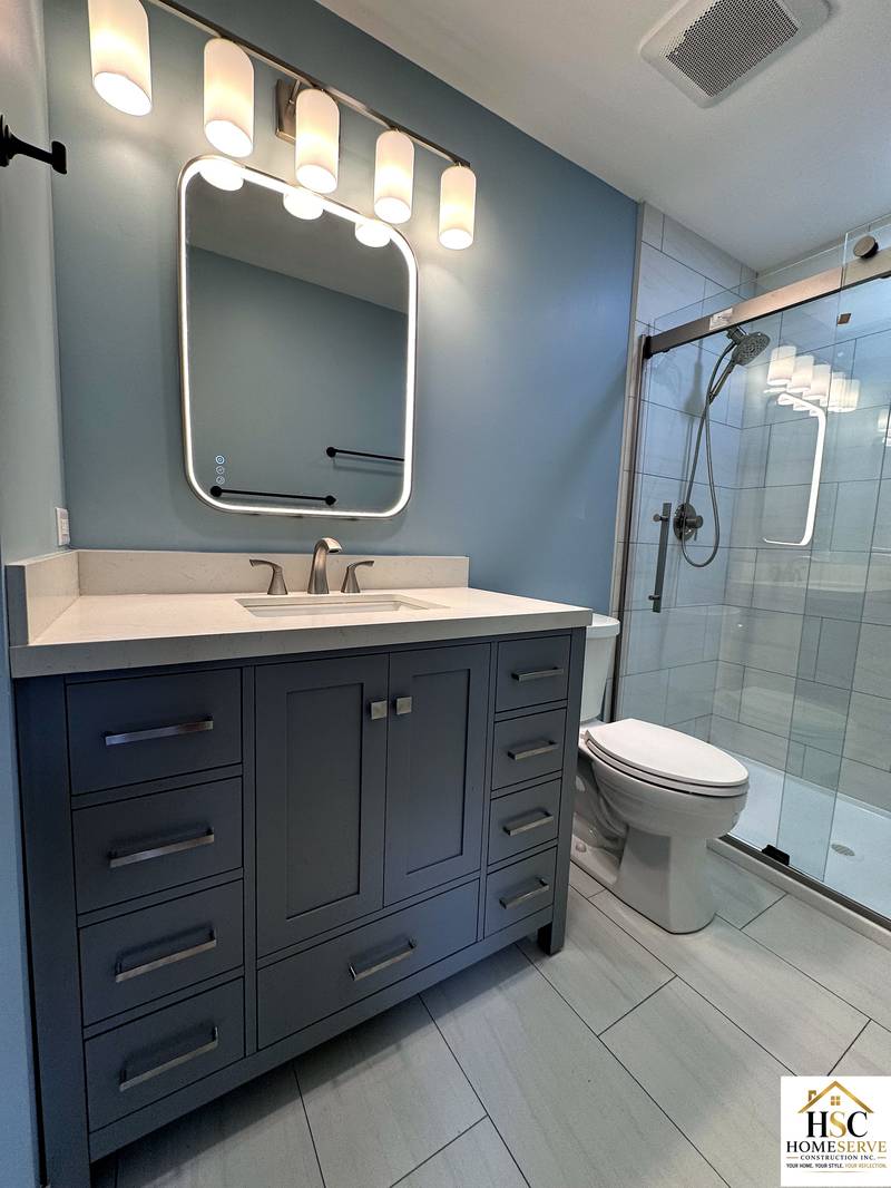 Finished vanity and walk-in glass shower