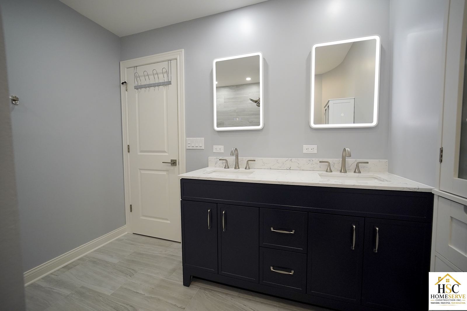 Gurnee bathroom after - double vanity with mirrors and closet door