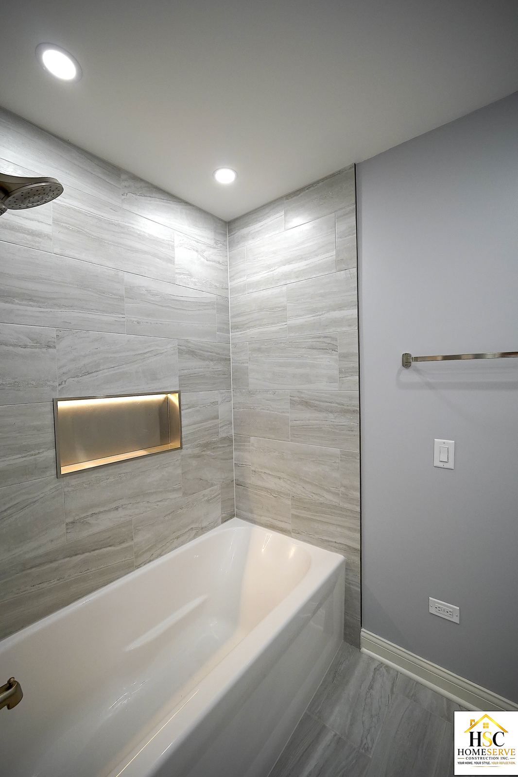 Gurnee bathroom after - shower corner and towel bar