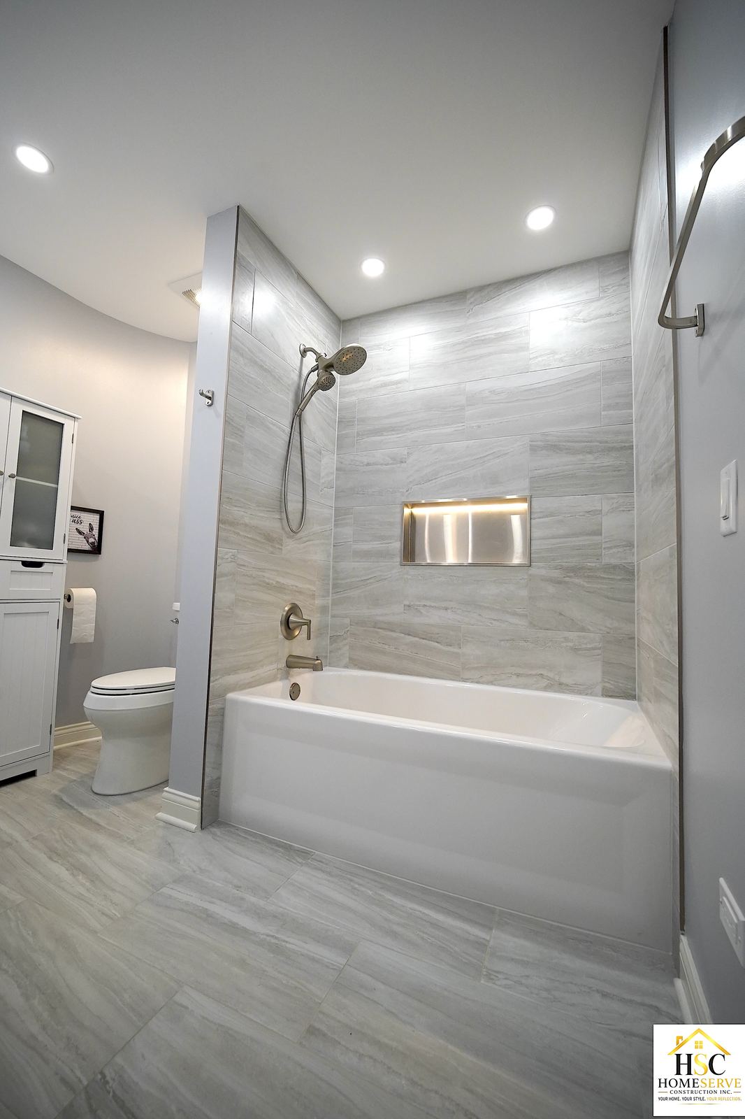 Gurnee bathroom after: new tub and tiled shower wall