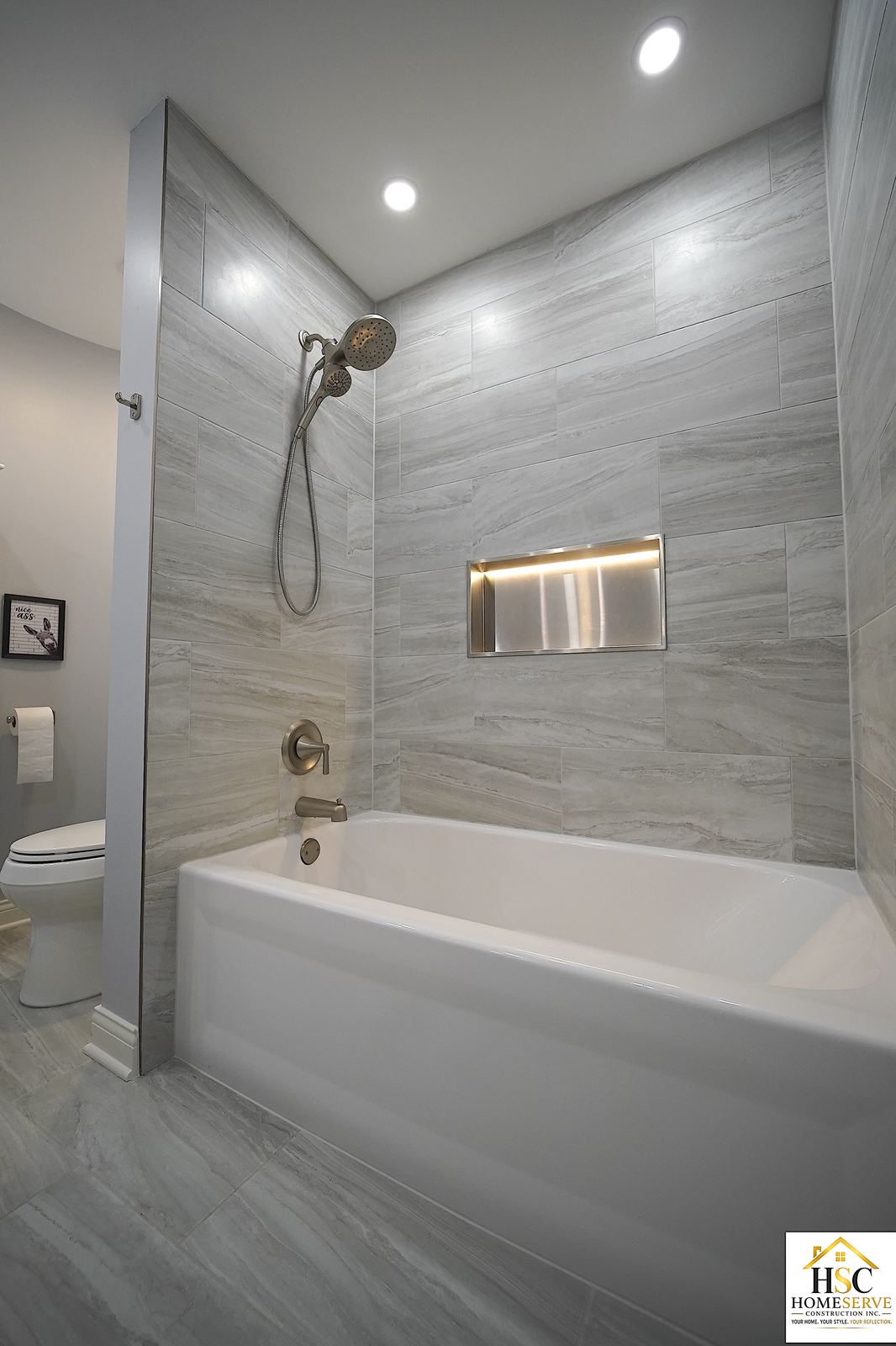 Gurnee bathroom after - tub, shower niche, and toilet nook