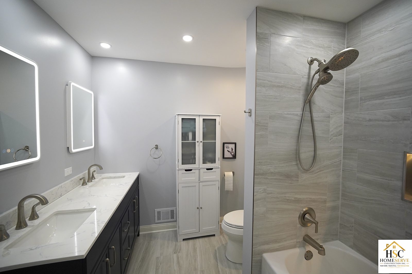 Gurnee bathroom - finished double vanity and tiled tub wall