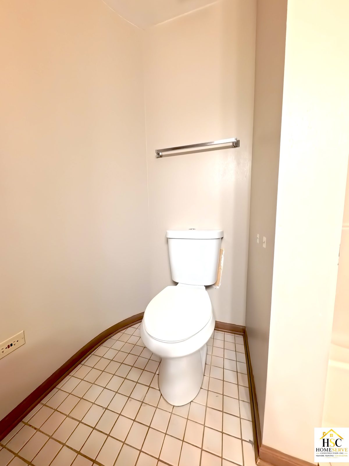 Gurnee bathroom - original toilet nook with tile floor