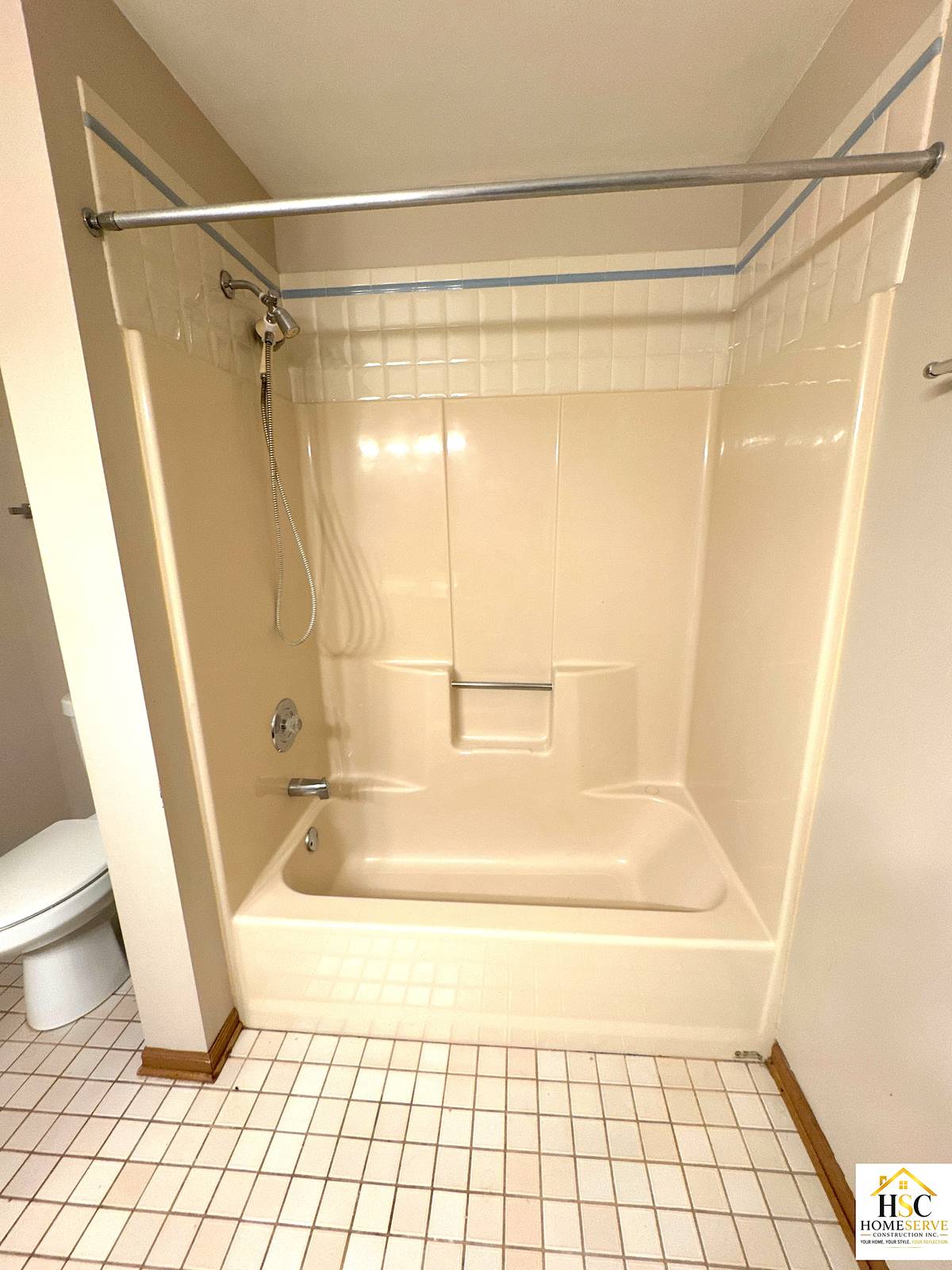 Gurnee bathroom before: original tub and shower surround
