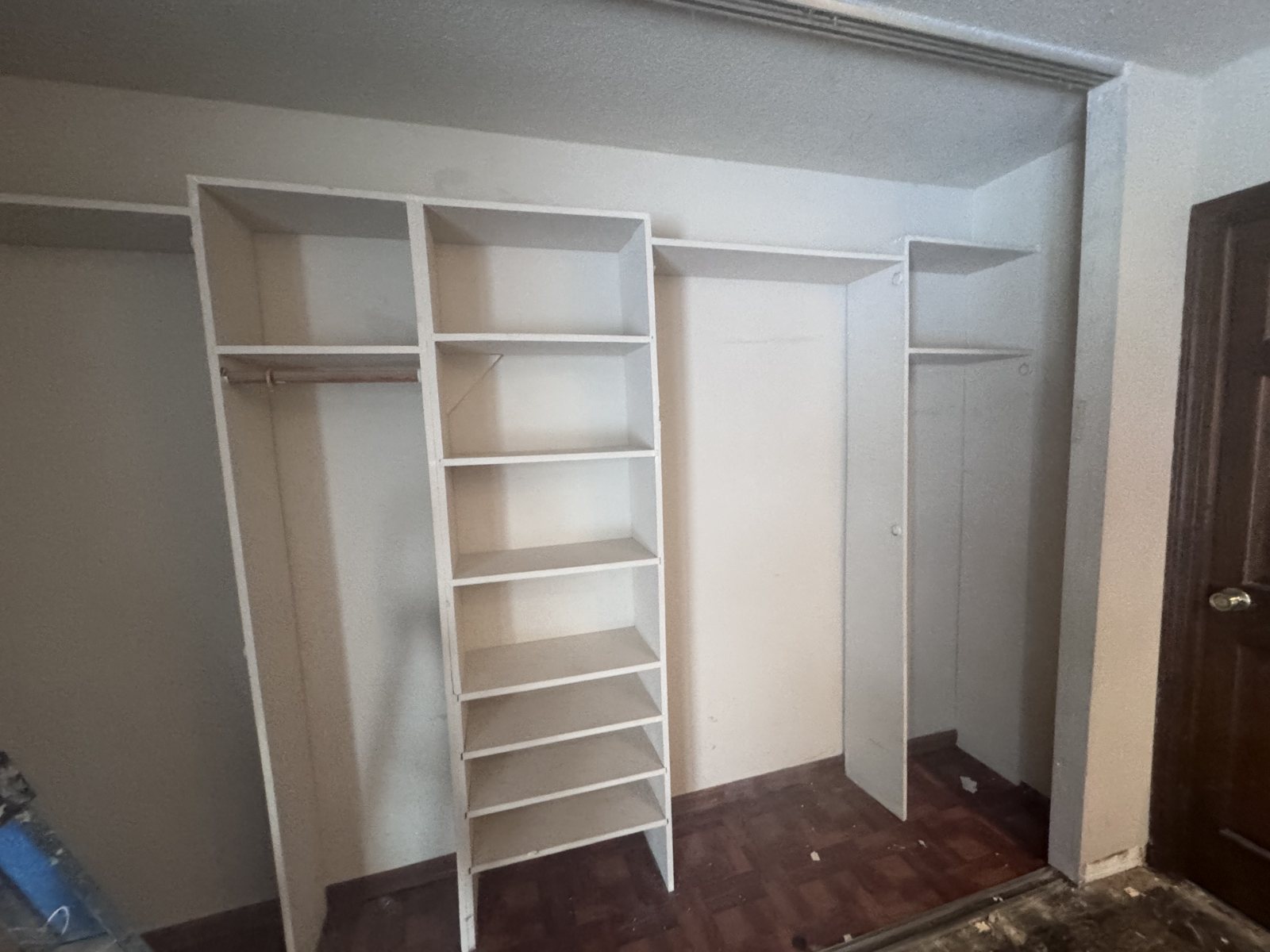 Hanover Park bedroom before: closet with the old shelving