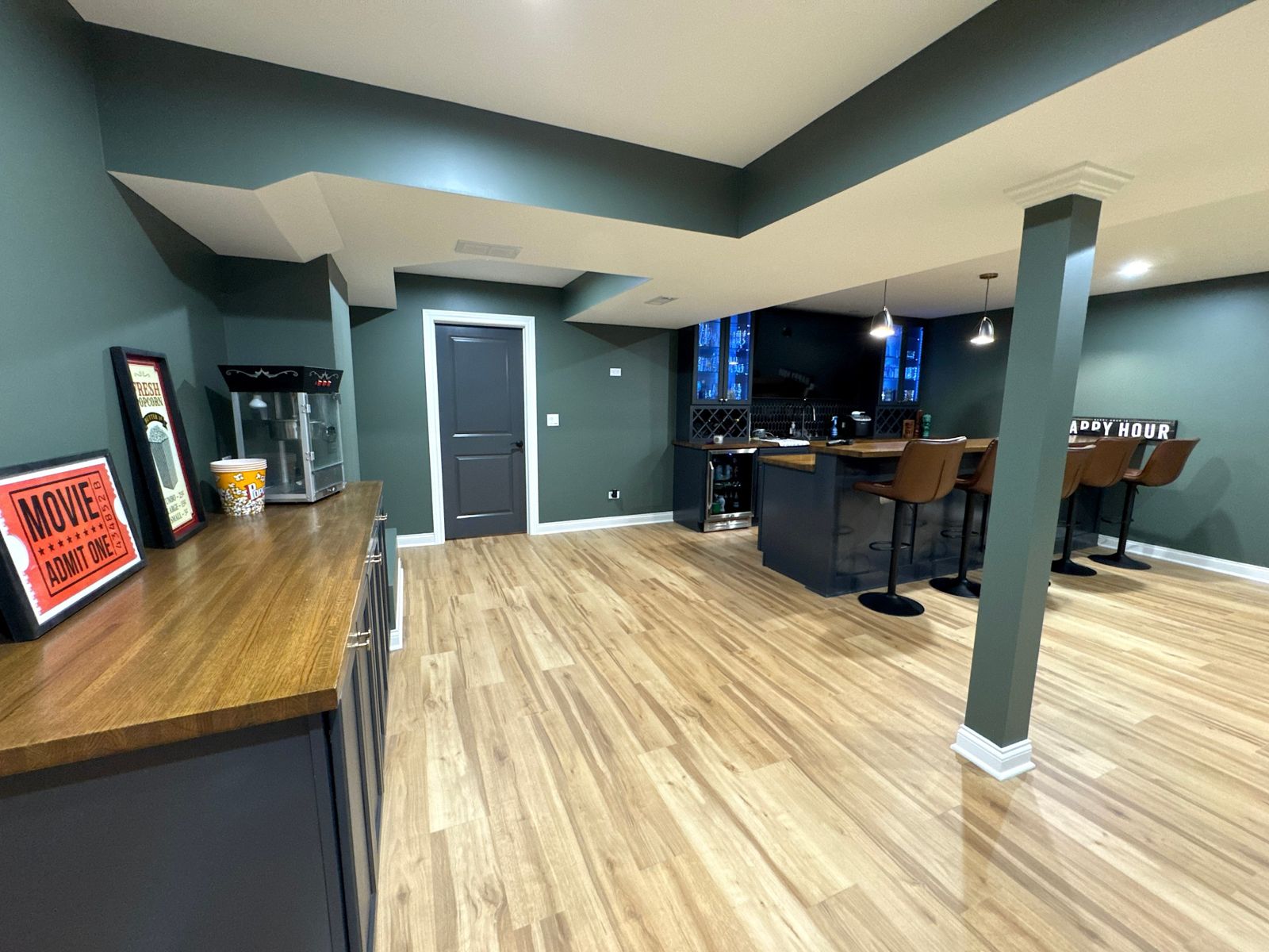 Finished basement bar and movie snack area