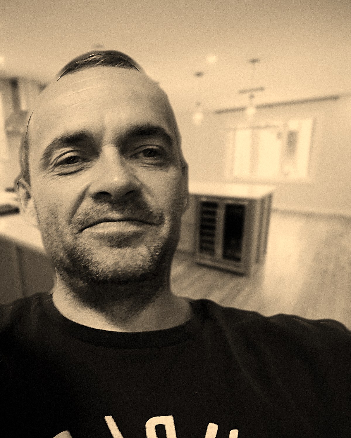 Jerry Jankowski, founder of HSC HomeServe Construction, in a finished kitchen